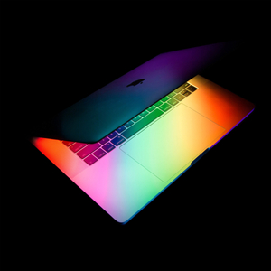 MacBook pro with colourful glow