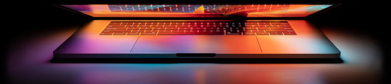 MacBook Pro with an orange glow